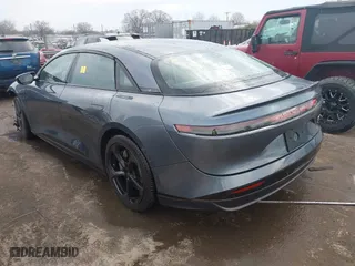 2024 Lucid Air Touring with VIN 50EA1TEA4RA004799, listed as a IAAI auction lot 41651768 with 7,779 mi miles. Bid and sale history available at carsss.com. Image 3.