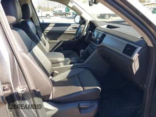 2018 Volkswagen Atlas SE with VIN 1V2CR2CA0JC571988, listed as a IAAI auction lot 41848862 with 96,426 mi miles and . Bid and sale history available at DreamBid. Image 5.