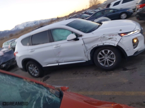 2019 Hyundai Santa Fe SE with VIN 5NMS23AD9KH077362, listed as a IAAI auction lot 41890584 with 132,476 mi miles. Bid and sale history available at carsss.com. Image 13.