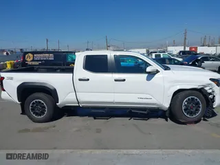 2024 Toyota Tacoma 4WD SR5 with VIN 3TMLB5JN1RM050446, listed as a IAAI auction lot 41658922 with 9,369 mi miles. Bid and sale history available at carsss.com. Image 13.