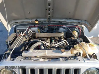 2005 Jeep Wrangler Unlimited with VIN 1J4FA44S65P335444, listed as a IAAI auction lot 41731093 with 143,918 mi miles. Bid and sale history available at carsss.com. Image 10.