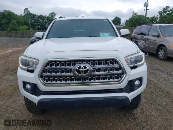 2017 Toyota Tacoma SR5 z VIN 5TFCZ5AN9HX115659, wystawiony jako IAAI lot #42375002 z przebiegiem 105 170 mil mil oraz . Historia ofert i sprzedaży dostępna na DreamBid. Obrazek 12.