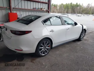 2019 Mazda 3 w/Select with VIN JM1BPACL2K1106916, listed as a IAAI auction lot 42082381 with 63,017 mi miles. Bid and sale history available at carsss.com. Image 4.