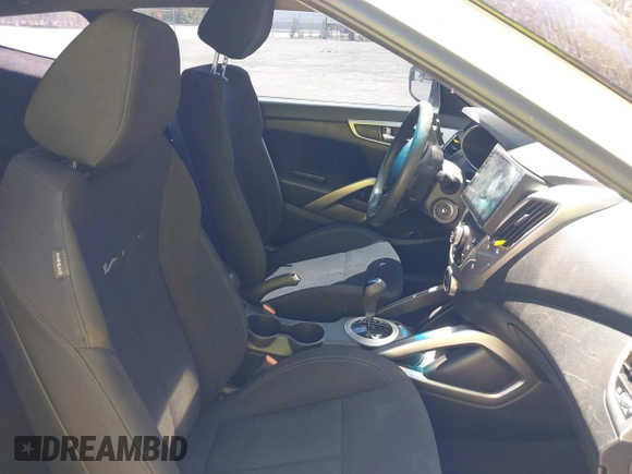2016 Hyundai Veloster with VIN KMHTC6AD3GU270895, listed as a IAAI auction lot 42139765 with 138,884 mi miles. Bid and sale history available at carsss.com. Image 5.
