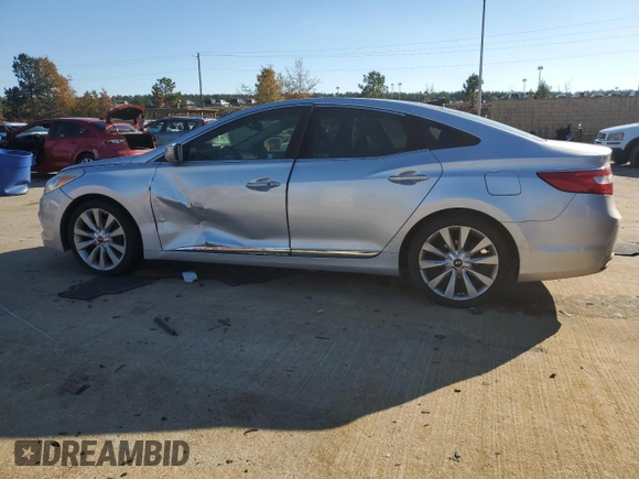 2014 Hyundai Azera Limited z VIN KMHFH4JG3EA360317, wystawiony jako Copart lot #79748564 z przebiegiem Nie podano mil oraz Szkoda całkowita • Salvage title. Historia ofert i sprzedaży dostępna na DreamBid. Obrazek 2.
