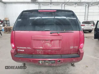 2013 GMC Yukon XL SLT with VIN 1GKS2KE75DR333420, listed as a IAAI auction lot 41712106 with 234,473 mi miles. Bid and sale history available at carsss.com. Image 16.