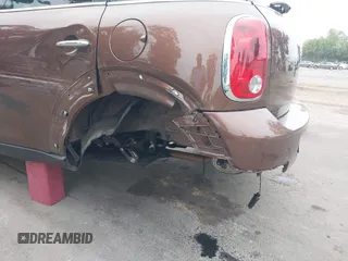 2013 MINI Countryman with VIN WMWZB3C56DWM09484, listed as a IAAI auction lot 42039954 with 37,264 mi miles and . Bid and sale history available at DreamBid. Image 6.