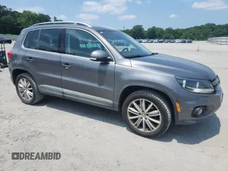 2013 Volkswagen Tiguan SE with VIN WVGBV7AX8DW011356, listed as a Copart auction lot 58099355 with 99,513 mi miles and Salvage title. Bid and sale history available at DreamBid. Image 4.