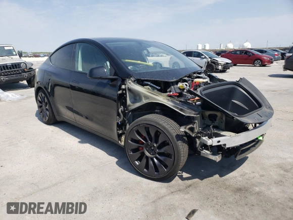 2023 Tesla Model Y Performance with VIN 7SAYGDEF9PF947667, listed as a Copart auction lot 52314795 with 40,634 mi miles and Salvage Title. Bid and sale history available at DreamBid. Image 4.