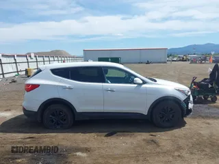2016 Hyundai Santa Fe z VIN 5XYZTDLB9GG364375, wystawiony jako IAAI lot #42203404 z przebiegiem 143 838 mil mil oraz . Historia ofert i sprzedaży dostępna na DreamBid. Obrazek 13.