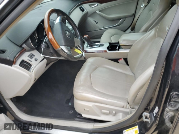 2009 Cadillac CTS AWD w/1SA with VIN 1G6DH577590123416, listed as a Copart auction lot 48297495 with 142,728 mi miles and Salvage Title. Bid and sale history available at carsss.com. Image 7.