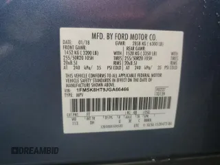 2018 Ford Explorer Platinum z VIN 1FM5K8HT9JGA66466, wystawiony jako Copart lot #56794895 z przebiegiem 84 733 mil mil oraz Szkoda całkowita • Salvage title. Historia ofert i sprzedaży dostępna na DreamBid. Obrazek 13.