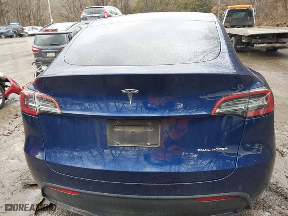 2022 Tesla Model Y Long Range with VIN 7SAYGDEE2NF421448, listed as a IAAI auction lot 41619301 with 44,562 mi miles. Bid and sale history available at carsss.com. Image 16.
