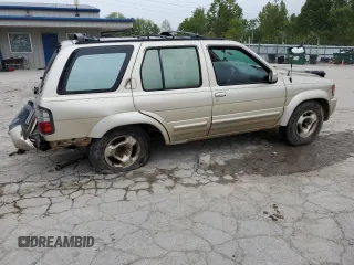 1997 Infiniti QX4 z VIN JNRAR05Y1VW016494, wystawiony jako Copart lot #73627434 z przebiegiem 270 857 mil mil oraz Szkody całkowita. Historia ofert i sprzedaży dostępna na DreamBid. Obrazek 3.
