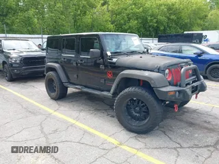 2014 Jeep Wrangler Unlimited Sahara with VIN 1C4BJWEG0EL248401, listed as a IAAI auction lot 42306970 with 134,904 mi miles and . Bid and sale history available at DreamBid. Image 1.