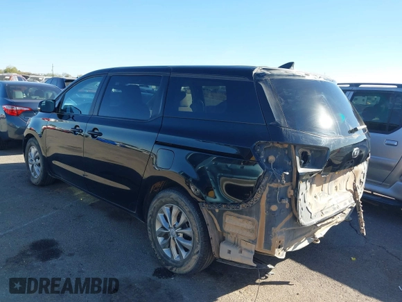 2020 Kia Sedona EX with VIN KNDMB5C11L6594029, listed as a IAAI auction lot 40951800 with 164,989 mi miles. Bid and sale history available at carsss.com. Image 3.
