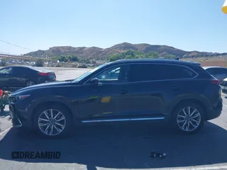 2017 Mazda CX-9 Grand Touring with VIN JM3TCBDY0H0130671, listed as a IAAI auction lot 42514237 with 81,016 mi miles and . Bid and sale history available at DreamBid. Image 14.