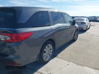 2018 Honda Odyssey LX with VIN 5FNRL6H2XJB041746, listed as a IAAI auction lot 41232936 with 119,509 mi miles. Bid and sale history available at carsss.com. Image 4.