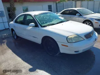 2003 Mercury Sable GS with VIN 1MEFM50U73A602499, listed as a IAAI auction lot 41756478 with 64,375 mi miles. Bid and sale history available at carsss.com. Image 1.