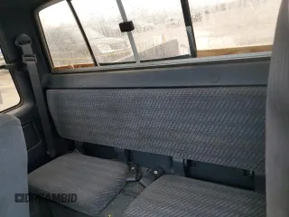 1991 Toyota Pickup DLX z VIN JT4VN13GXM5041525, wystawiony jako Copart lot #80709474 z przebiegiem 309 094 mil mil oraz Szkoda całkowita • Salvage title. Historia ofert i sprzedaży dostępna na DreamBid. Obrazek 10.