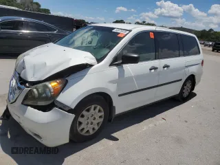 2010 Honda Odyssey LX with VIN 5FNRL3H23AB032112, listed as a Copart auction lot 60876035 with 223,335 mi miles and Salvage title. Bid and sale history available at DreamBid. Image 1.