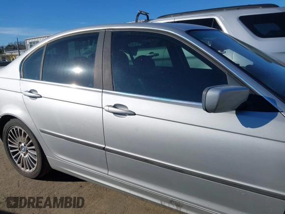 2003 BMW 3 Series 330xi with VIN WBAEW53493PN30296, listed as a IAAI auction lot 41429776 with 233,013 mi miles. Bid and sale history available at carsss.com. Image 13.