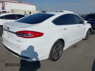 2018 Ford Fusion Titanium with VIN 3FA6P0RU0JR117158, listed as a IAAI auction lot 41435172 with 98,390 mi miles and . Bid and sale history available at DreamBid. Image 4.