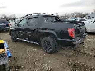 2010 Honda Ridgeline RTL with VIN 5FPYK1F5XAB013533, listed as a Copart auction lot 46882435 with 241,619 mi miles and Salvage Title. Bid and sale history available at carsss.com. Image 2.