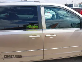 2014 Dodge Grand Caravan SXT with VIN 2C4RDGCG6ER466459, listed as a IAAI auction lot 41820907 with 105,404 mi miles and . Bid and sale history available at DreamBid. Image 12.
