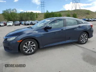 2017 Honda Civic EX z VIN 19XFC2F71HE014428, wystawiony jako Copart lot #57505525 z przebiegiem 125 103 mil mil oraz Szkoda całkowita • Salvage title. Historia ofert i sprzedaży dostępna na DreamBid. Obrazek 1.