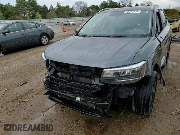 2022 Volkswagen Taos SE z VIN 3VVLX7B28NM041868, wystawiony jako Copart lot #53472735 z przebiegiem 80 509 mil mil oraz Szkody całkowita. Historia ofert i sprzedaży dostępna na DreamBid. Obrazek 14.