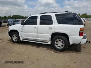 2003 GMC Yukon Denali z VIN 1GKEK63U33J316027, wystawiony jako Copart lot #56869815 z przebiegiem 200 916 mil mil oraz Szkoda całkowita • Salvage title. Historia ofert i sprzedaży dostępna na DreamBid. Obrazek 2.