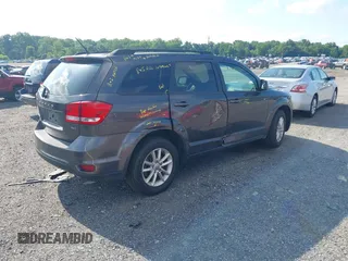 2017 Dodge Journey SXT z VIN 3C4PDDBG3HT540624, wystawiony jako IAAI lot #42719281 z przebiegiem 56 999 mil mil oraz . Historia ofert i sprzedaży dostępna na DreamBid. Obrazek 4.