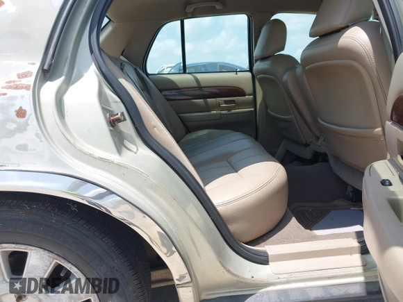 2004 Mercury Grand Marquis LS Premium z VIN 2MEFM75WX4X607033, wystawiony jako IAAI lot #42332543 z przebiegiem 179 297 mil mil oraz . Historia ofert i sprzedaży dostępna na DreamBid. Obrazek 8.