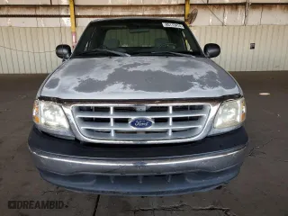 2003 Ford F-150 XL with VIN 1FTRX07233KD43811, listed as a Copart auction lot 85113414 with 215,390 mi miles and Salvage Title. Bid and sale history available at carsss.com. Image 5.