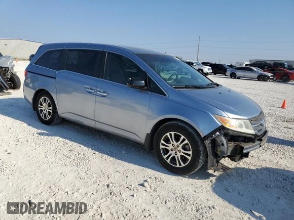2011 Honda Odyssey EX-L with VIN 5FNRL5H63BB098207, listed as a Copart auction lot 75200284 with 191,504 mi miles and Salvage Title. Bid and sale history available at DreamBid. Image 4.