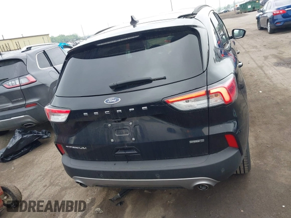 2021 Ford Escape Titanium Hybrid with VIN 1FMCU9DZ5MUA18079, listed as a IAAI auction lot 42340093 with 71,630 mi miles and . Bid and sale history available at DreamBid. Image 16.