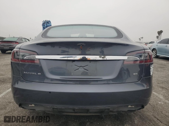 2014 Tesla Model S 60 with VIN 5YJSA1H10EFP60690, listed as a Copart auction lot 62515065 with 57,864 mi miles and Clean title. Bid and sale history available at DreamBid. Image 6.