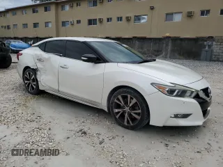 2017 Nissan Maxima SV with VIN 1N4AA6APXHC446995, listed as a Copart auction lot 51633115 with 56,949 mi miles and Salvage Title. Bid and sale history available at DreamBid. Image 4.