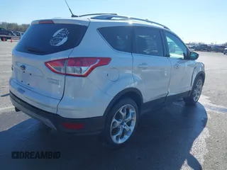 2013 Ford Escape Titanium with VIN 1FMCU0J96DUA71857, listed as a IAAI auction lot 41877003 with 118,864 mi miles and . Bid and sale history available at carsss.com. Image 4.