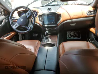 2017 Maserati Ghibli z VIN ZAM57XSL0H1203506, wystawiony jako Copart lot #56698805 z przebiegiem 67 714 mil mil oraz Tytuł czysty. Historia ofert i sprzedaży dostępna na DreamBid. Obrazek 8.