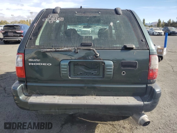 2004 Isuzu Rodeo S with VIN 4S2CK58W344303242, listed as a Copart auction lot 75339714 with 106,659 mi miles and Salvage title. Bid and sale history available at DreamBid. Image 6.