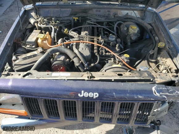 1999 Jeep Cherokee Sport with VIN 1J4FF68S0XL614521, listed as a Copart auction lot 49289845 with 238,449 mi miles and Clean Title. Bid and sale history available at carsss.com. Image 12.