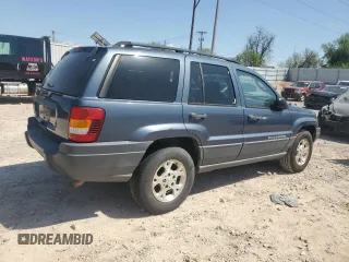 2003 Jeep Grand Cherokee Laredo with VIN 1J4GX48S83C504543, listed as a Copart auction lot 52723835 with 220,574 mi miles and Clean Title. Bid and sale history available at carsss.com. Image 3.