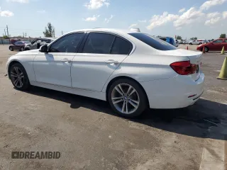 2018 BMW 3 Series 330i with VIN WBA8B9C58JEE80964, listed as a Copart auction lot 57103285 with 188,488 mi miles and Salvage title. Bid and sale history available at DreamBid. Image 2.