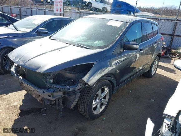 2015 Ford Escape SE with VIN 1FMCU9G99FUA81345, listed as a IAAI auction lot 41701043 with 203,300 mi miles. Bid and sale history available at carsss.com. Image 2.