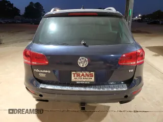 2012 Volkswagen Touareg Exec with VIN WVGEF9BP8CD007760, listed as a Copart auction lot 79271654 with 164,287 mi miles and Clean Title. Bid and sale history available at DreamBid. Image 6.