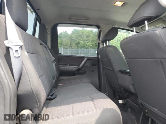 2012 Nissan Titan SV z VIN 1N6AA0EJ9CN325608, wystawiony jako Copart lot #58925565 z przebiegiem 86 967 mil mil oraz Szkoda całkowita • Salvage title. Historia ofert i sprzedaży dostępna na DreamBid. Obrazek 10.