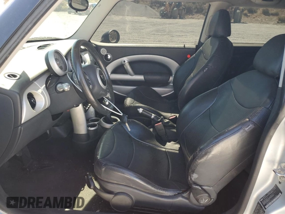 2002 MINI Hardtop with VIN WMWRC33472TC34281, listed as a Copart auction lot 71631644 with 196,947 mi miles and Salvage Title. Bid and sale history available at DreamBid. Image 7.