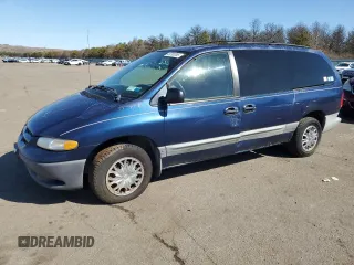 2000 Dodge Caravan SE with VIN 2B4GP44R7YR669746, listed as a Copart auction lot 49793365 with 149,019 mi miles and Salvage title. Bid and sale history available at DreamBid. Image 1.